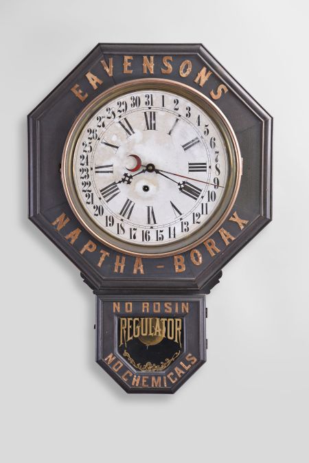 Advertising wall clock, 8 day time and simple calendar, spring driven movement in a cutomized case with advertising for "EAVENSONS NAPTHA-BORAX" with "NO ROSIN NO CHEMICALS" applied around bottom door