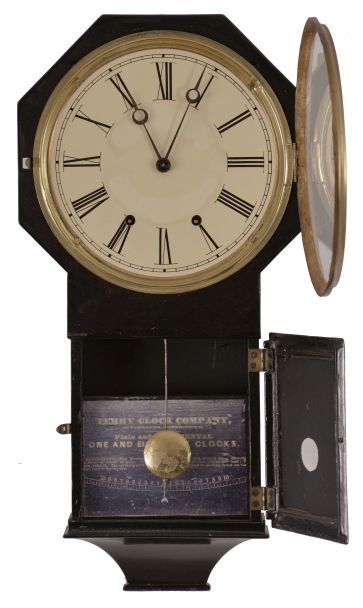 Terry Clock Co., Waterbury, Conn., "Octagon Top Drop", 8 day, time and strike, brass spring movement wall clock