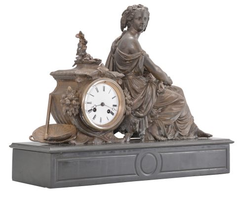 Japy Frères & Cie, Paris, France, figural mantel clock, 8 day, time and strike, spring driven pendule de Paris movement, black slate base with molded front and top supporting a cast spelter case with agrarian theme including a basket and hoe, and seated female figure with a sickle in one hand and a sheaf of wheat in the other, white enamel dial with Roman numerals, and blued steel Breguet hands.