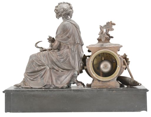 Japy Frères & Cie, Paris, France, figural mantel clock, 8 day, time and strike, spring driven pendule de Paris movement, black slate base with molded front and top supporting a cast spelter case with agrarian theme including a basket and hoe, and seated female figure with a sickle in one hand and a sheaf of wheat in the other, white enamel dial with Roman numerals, and blued steel Breguet hands.