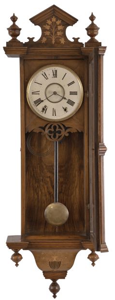 Anglo- American, Vienna style, 8 day, time and strike spring brass movement wall clock with an American movement.