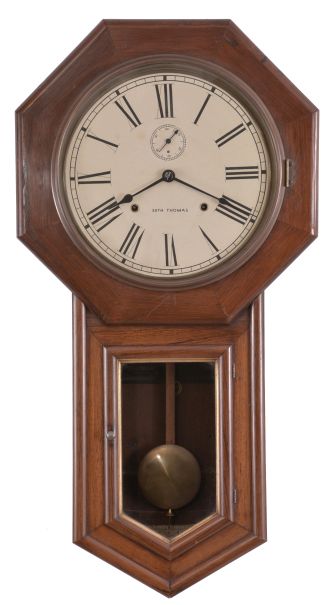 Clocks- 2 (Two): (1) E. N. Welch Mfg. Co., Forestville, Conn., "Verdi" hanging clock with a spring driven, 8 day, time and strike movement is a rosewood veneered case. c1880. (2) Seth Thomas Clock Co., Thomaston, Conn., "World" wall hanging clock with a spring driven 8 day time and strike movement in a rosewood veneered case. c1896.