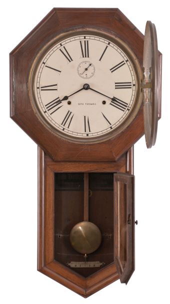 Clocks- 2 (Two): (1) E. N. Welch Mfg. Co., Forestville, Conn., "Verdi" hanging clock with a spring driven, 8 day, time and strike movement is a rosewood veneered case. c1880. (2) Seth Thomas Clock Co., Thomaston, Conn., "World" wall hanging clock with a spring driven 8 day time and strike movement in a rosewood veneered case. c1896.