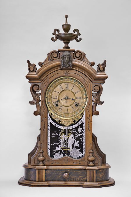 Ansonia Clock Co., New York, "Monarch" mantel clock with a spring driven 8 time and half hour strike movement in a black walnut case.