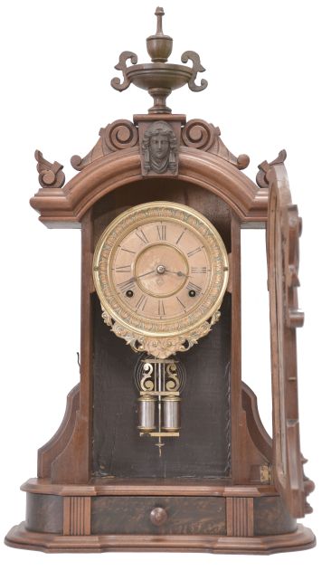 Ansonia Clock Co., New York, "Monarch" mantel clock with a spring driven 8 time and half hour strike movement in a black walnut case.