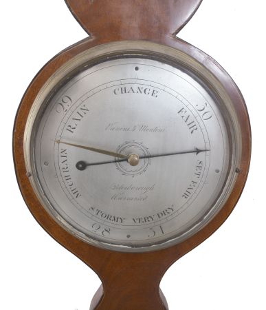 Vanini & Montini, Peterborough, England, wheel or banjo barometer with alcohol thermometer, in an inlaid mahogany veneered case with silvered dial and brass indicator knob.