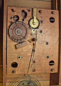 Riley Whiting, Winchester, Conn., 30 hour, time and strike weight wood movement carved column and eagle splat shelf clock.