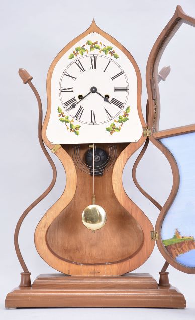 Copy of a Forestville Mfg. Co., Bristol, Conn., 8 day, time and strike spring brass movement shelf acorn clock.