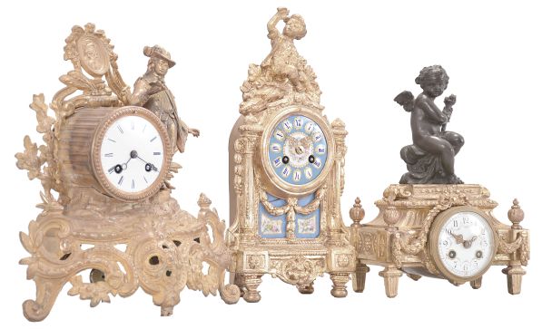 Clocks- 3 (Three) French: (1) Japy Frères & Cie, Paris, figural mantel clock, 8 day, time and strike, spring driven pendule de Paris movement in a gilt cast metal case featuring a finely dressed young man, c1865; (2) France, mantel clock, 8 day, time and strike, spring driven pendule de Paris movement in a gilt cast case with polychrome dial and panel surmounted by a boy holding a bird; (3) AD Mougin, Paris, mantel clock, 8 day, time and strike, spring driven movement with lever escapement in a gilt cast case with enamel dial, surmounted by a putto figure holding a torch, c1900.