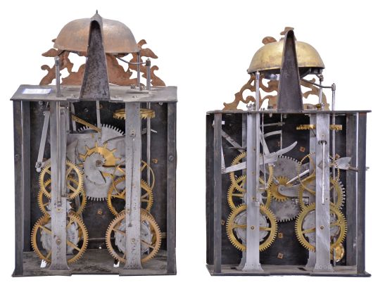 Clocks- 2 (Two) Comtoise with Cartouche Numerals: (1) France, bronze-front Comtoise clock, 8 day, time and strike with alarm, weight driven movement with verge escapement, thread suspension with rear-hanging pendulum in an iron post and plate frame, cast brass dial with royal symbols including a crown and profile of Louis XV, white enamel cartouche numerals with blue lettering, topped by cast fronton featuring fleur de lis and the backward facing Gallic rooster, applied lower casting, and single iron hand, mid 18th Century. (2) France, bronze-front Comtoise clock, 8 day, time and strike with alarm, weight driven movement with verge escapement, thread suspension with rear-hanging pendulum in a posted frame, 25 white enamel panels inset within cast brass dial, two iron hands, pieced brass spandrels, and topped by cast fronton with backward facing Gallic rooster, mid 18th Century.