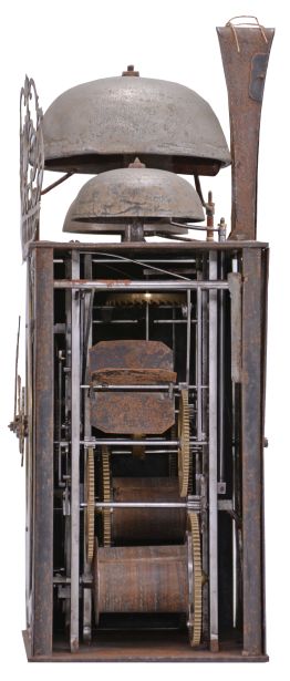 F. Farjaire, Saint-Étienne, France, three train Comtoise clock, 8 day, time and quarter strike with alarm, three bells, weight driven movement with verge escapement, thread suspension with rear-hanging pendulum in an iron post and plate frame, brass chapter with Roman numerals, Arabic numerals at 5 minute intervals on the outer rim, brass alarm ring with Arabic numerals, two iron hands, pivoted brass winding arbor shutters, engraved plaque with the maker