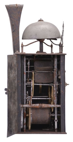 France, Comtoise clock, 8 day, time and strike with alarm, weight driven movement with verge escapement, thread suspension with rear-hanging pendulum in a iron post and plate frame, brass chapter ring with Roman numerals, brass alarm ring with Arabic numerals, pivoted winding arbor shutters, single pierced brass hand, all surmounted by a pierced brass fronton.