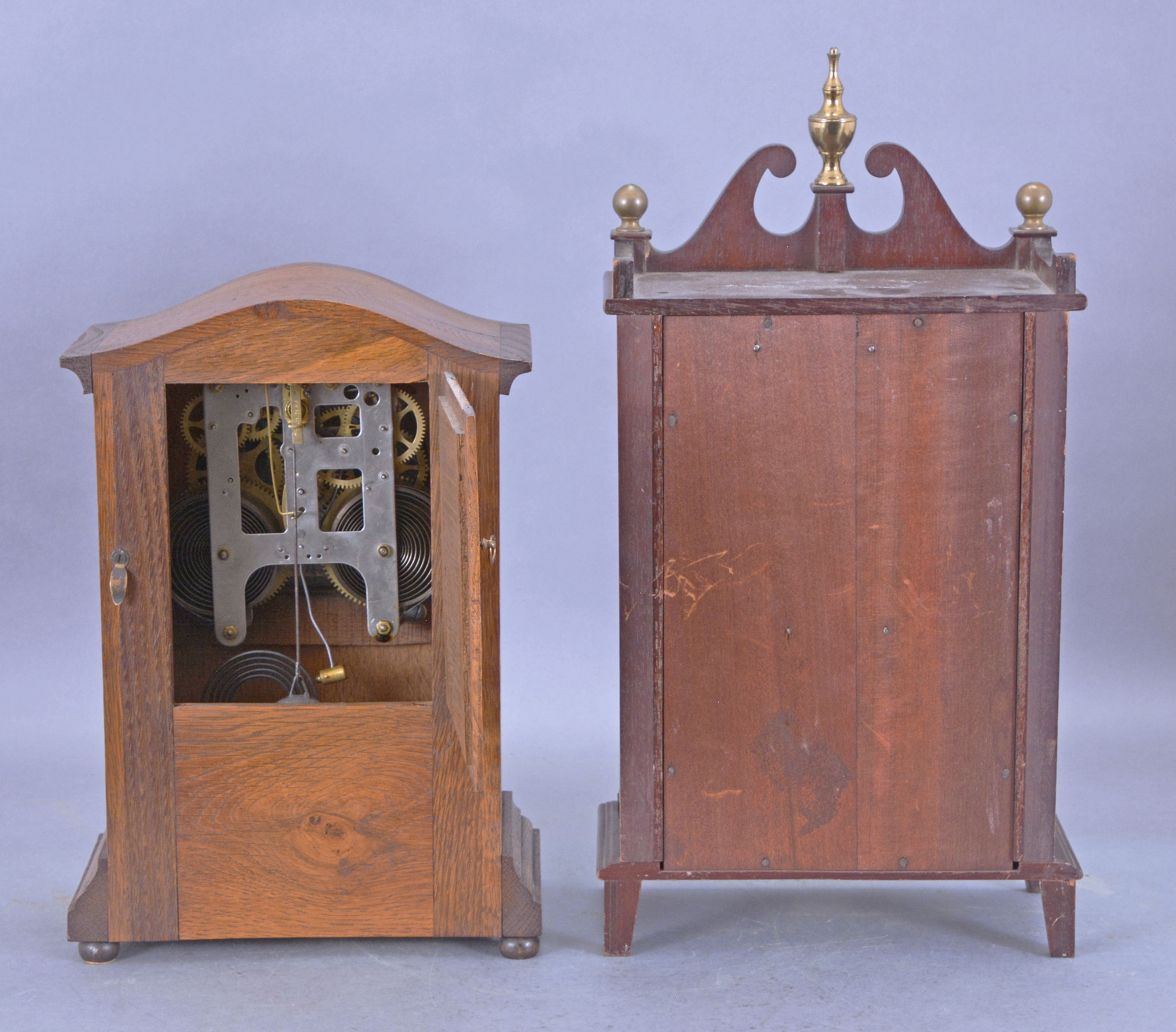 Four clocks. Steeple, small pillar & scroll, mantel and calendar clock.